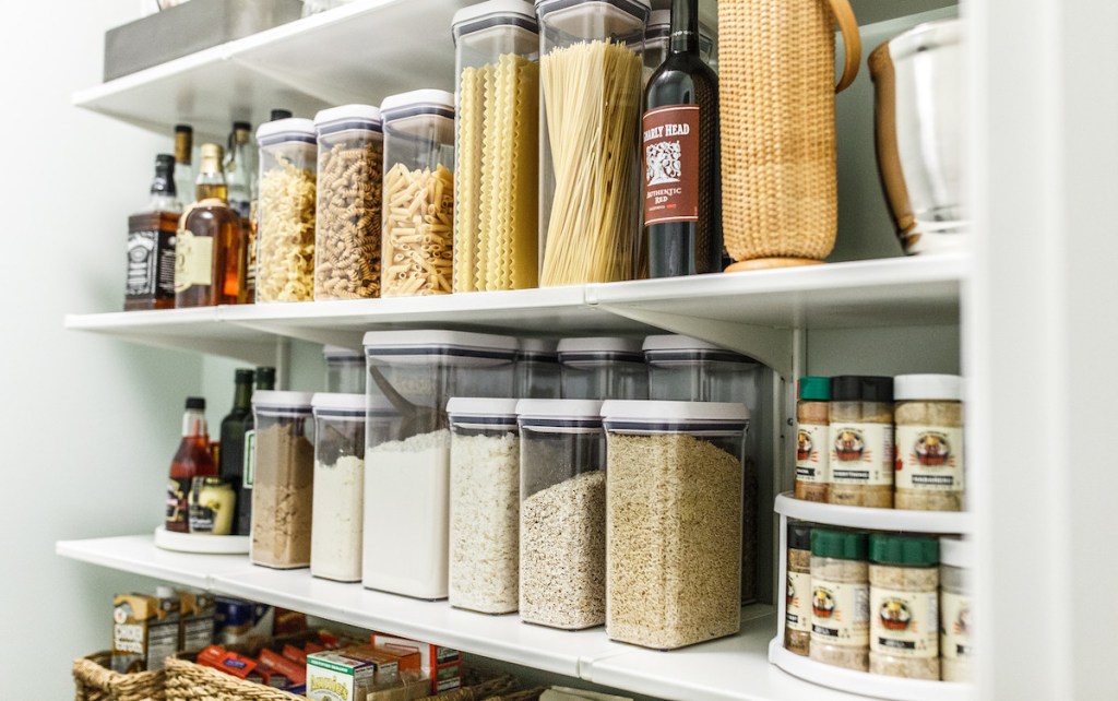 organized pantry with food containers and spices