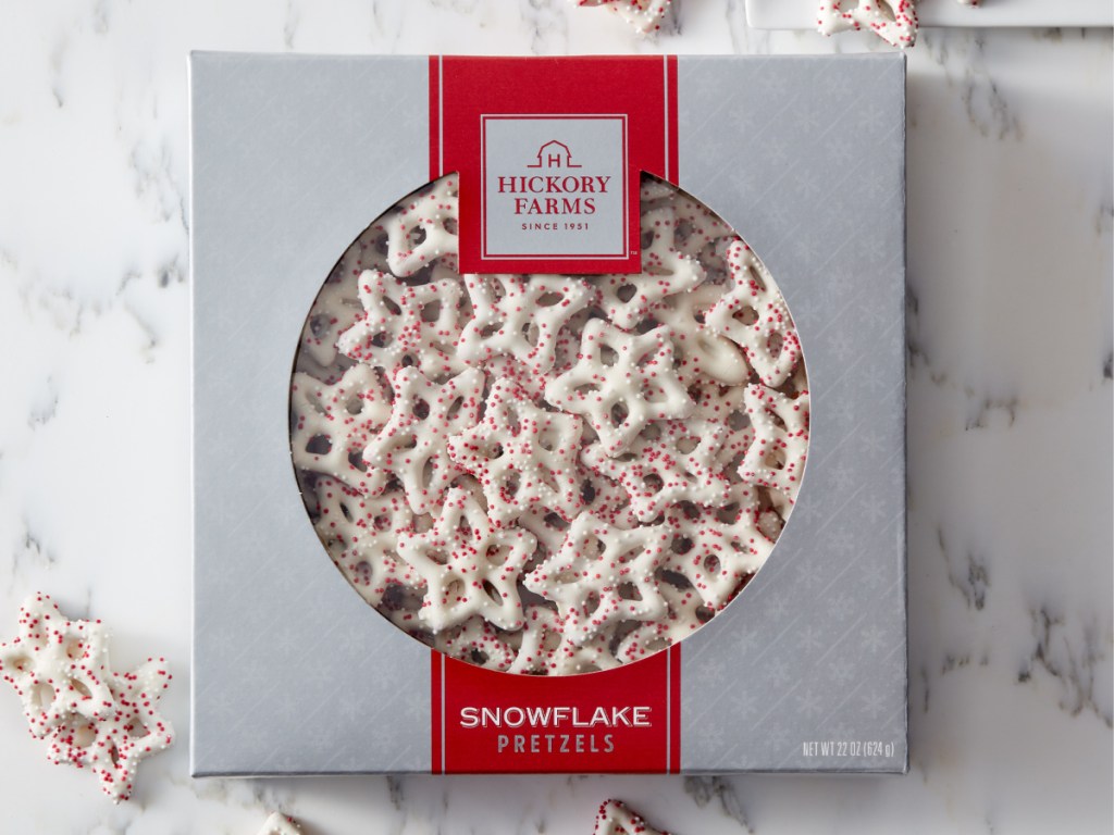 white chocolate snowflake pretzel box on marble table