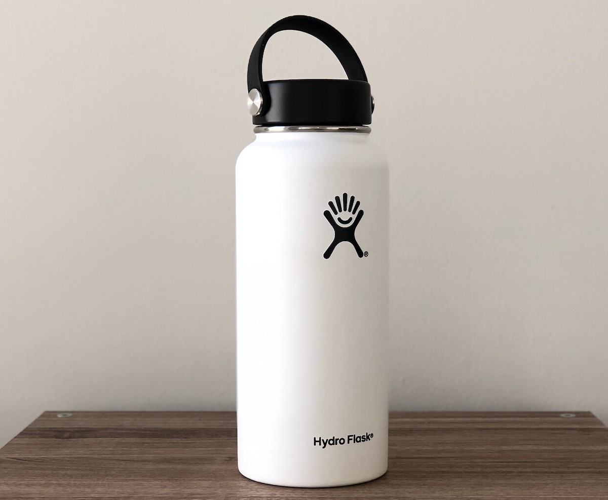 white hydro flask sitting on table