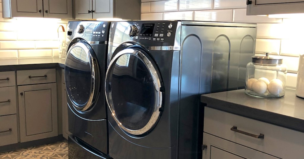dark blue washer and dryer in laundry room
