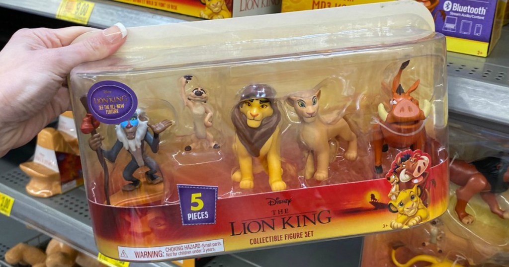 hand holding pack with Disney Lion King characters in it