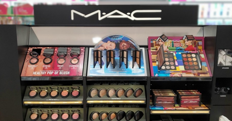 cosmetics display in store with several varieties including mac which has free birthday stuff