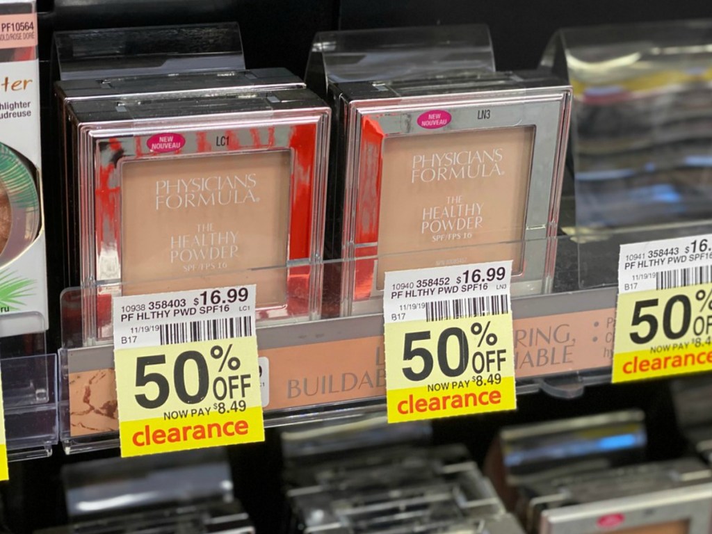 store shelf with make up products and price tags