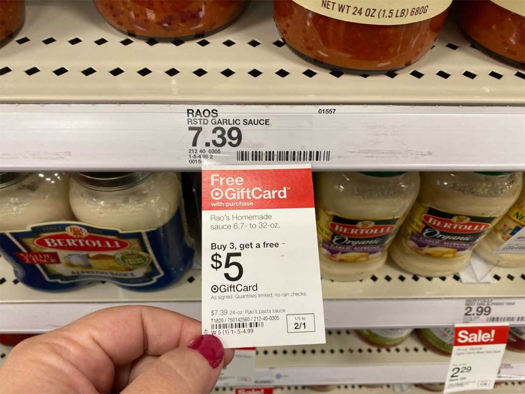 up close picture of the buy 3, get $5 free gift card at Target on a shelf raos homemade pasta sauce