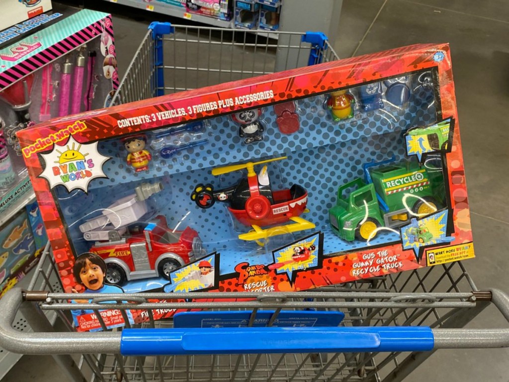 grocery cart with box of toy cars