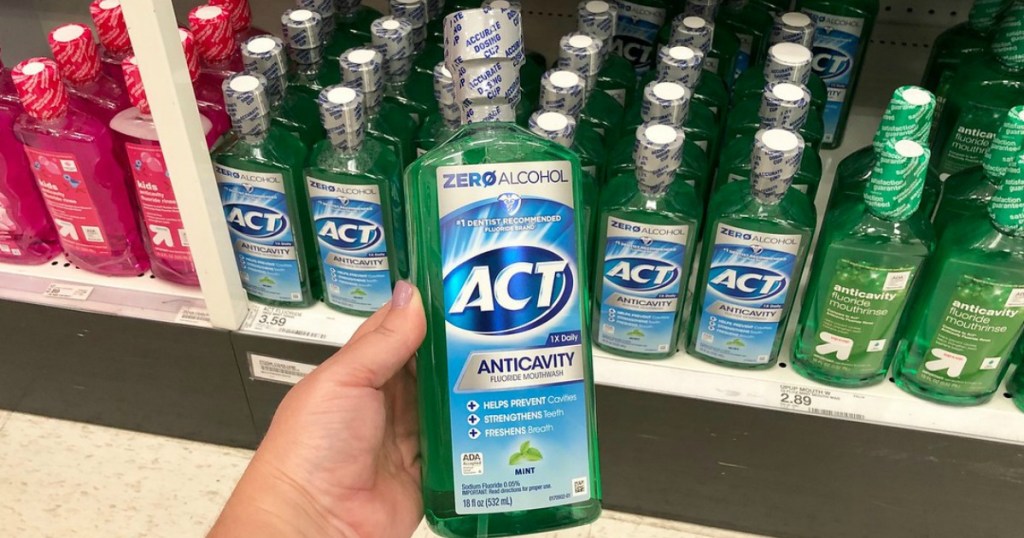 hand holding mouthwash in a store