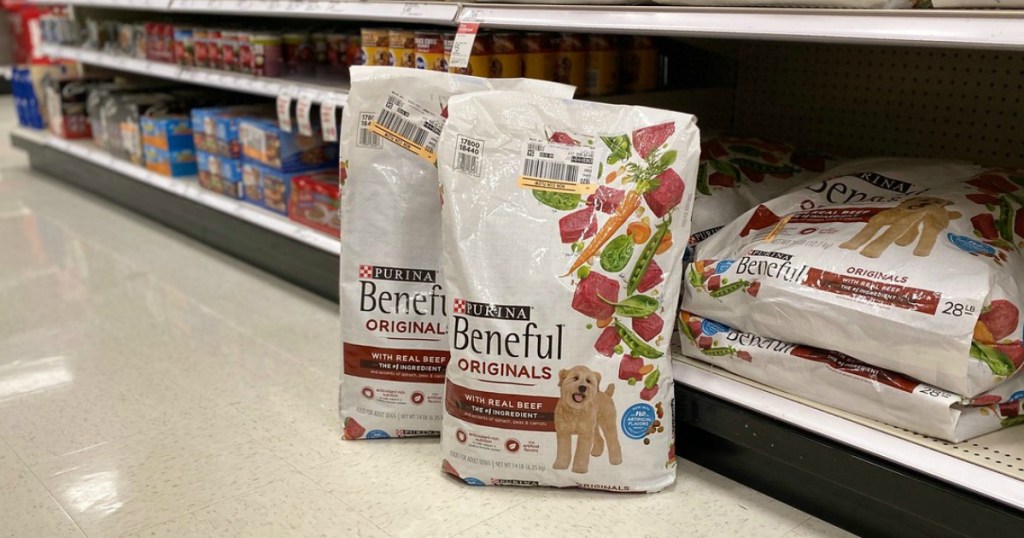 dry dog food bags on the floor in a store