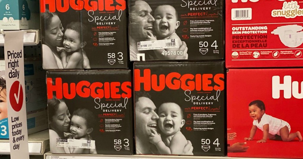 boxes of diapers on a store shelf