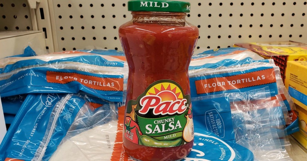 pace salsa on top of flour tortillas in a store