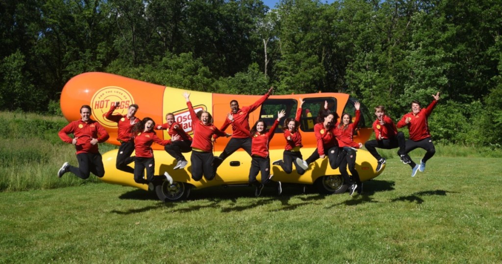 Oscar Meyer Wienermobile with its drivers