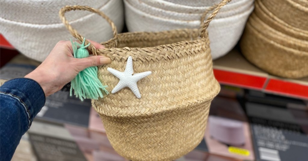 Woman holding straw basket in store