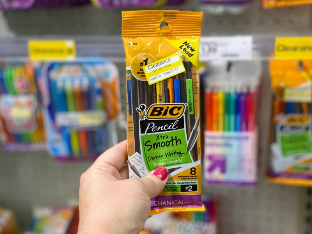 BIC Mechanical pencils in hand near in-store display
