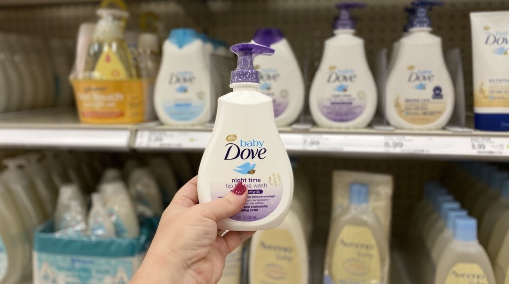 hand holding bottle of Baby Dove body wash
