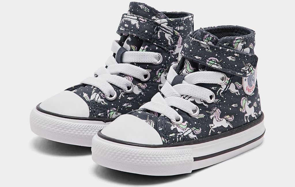 pair of Converse shoes with unicorns on them