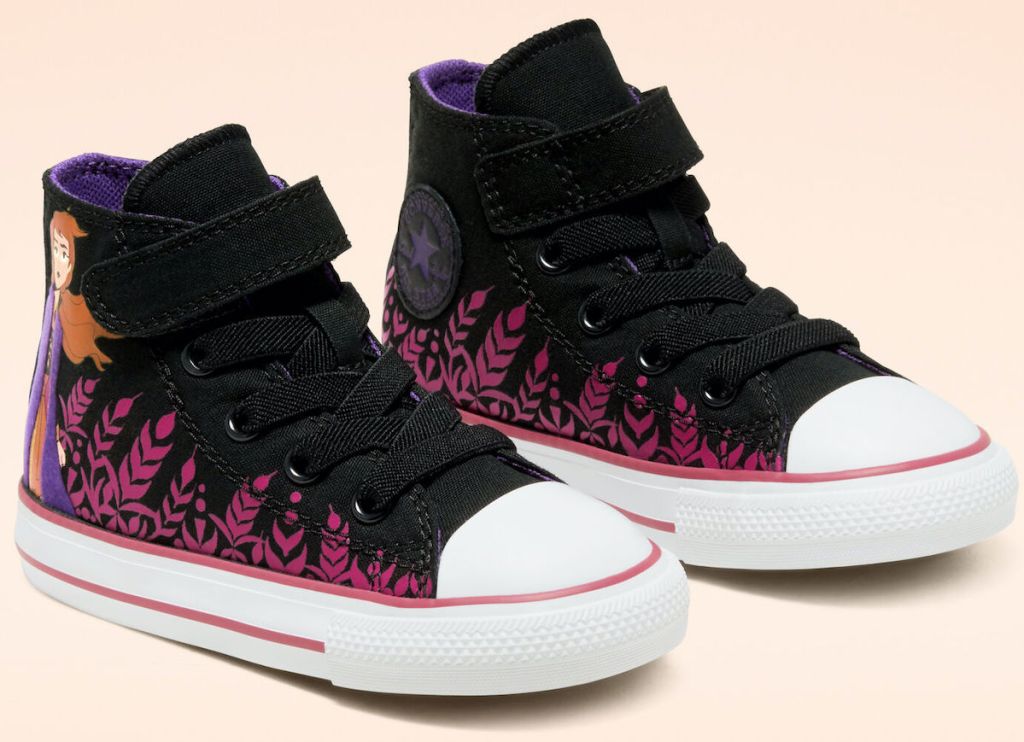pair of high top Converse x Frozen 2 Chuck Taylor All Star on pink background
