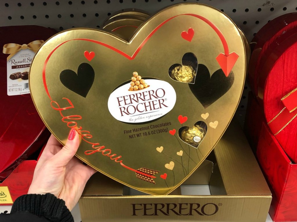 Large box of hazelnut chocolates in a golden heart-shaped gift box