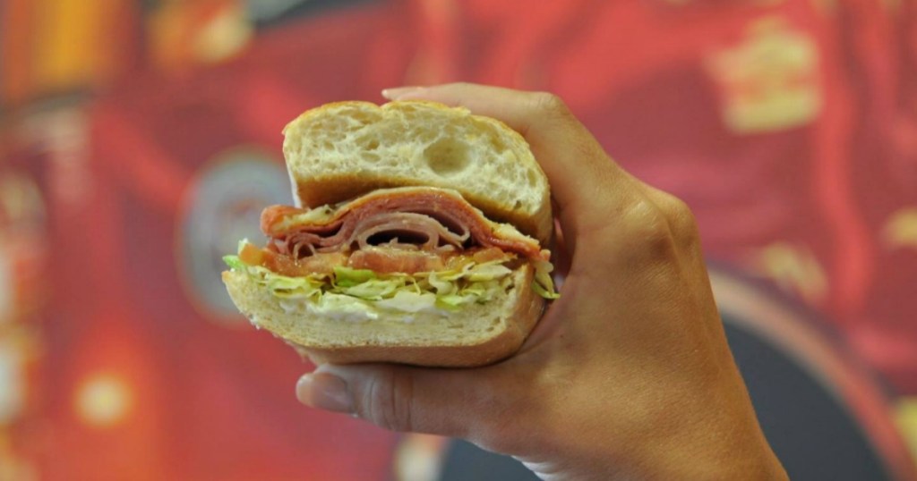 Person holding Firehouse sub