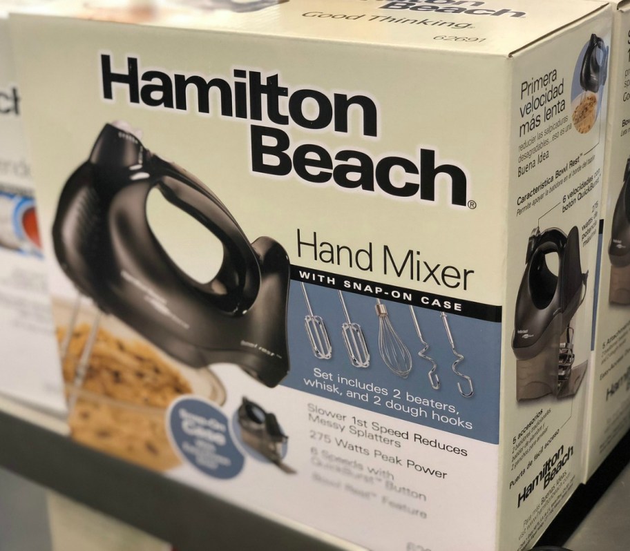 Package with a black hand mixer in package