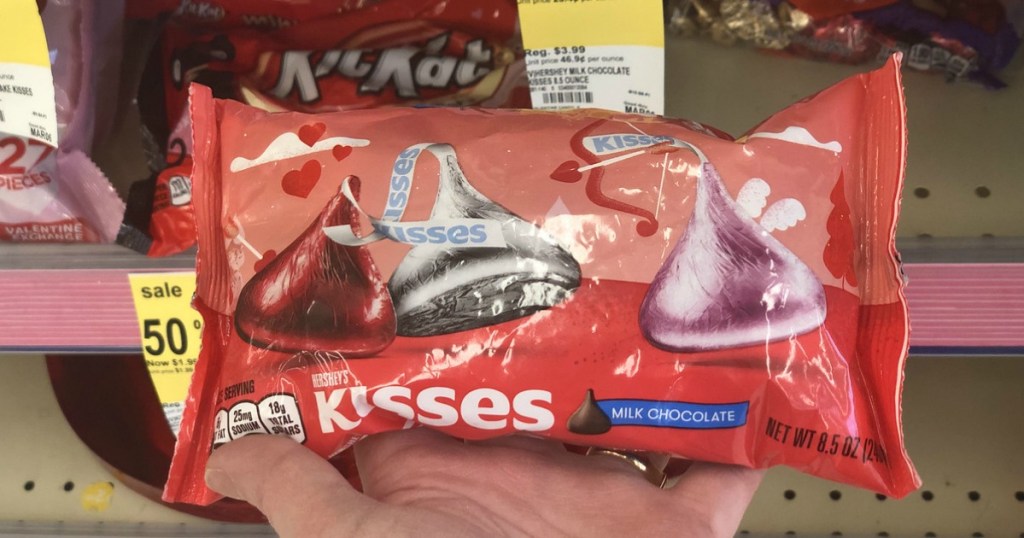 woman holding Hershey's Kisses Valentine candy bag