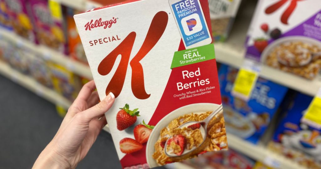 hand holding box of Kellogg's Special K Red Berries Cereal in CVS