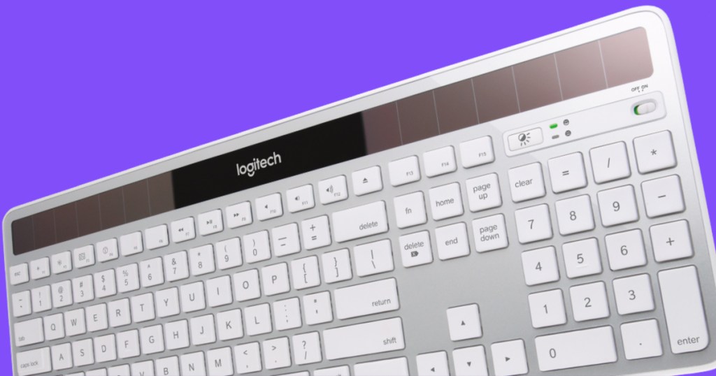 white Logitech K750 Wireless Solar Keyboard for Mac with purple background