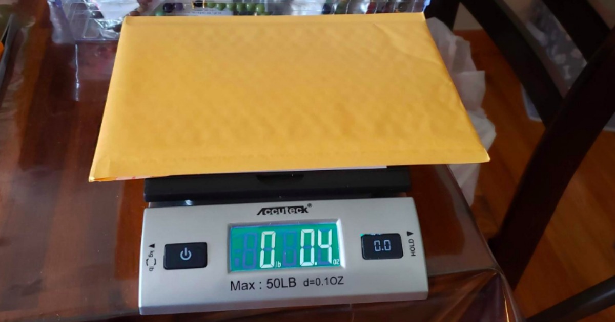 package on a mail scale sitting on a desk