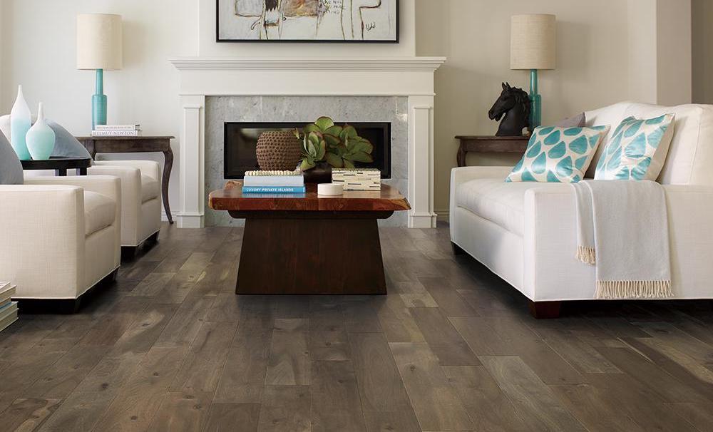 living room with couches and wood flooring