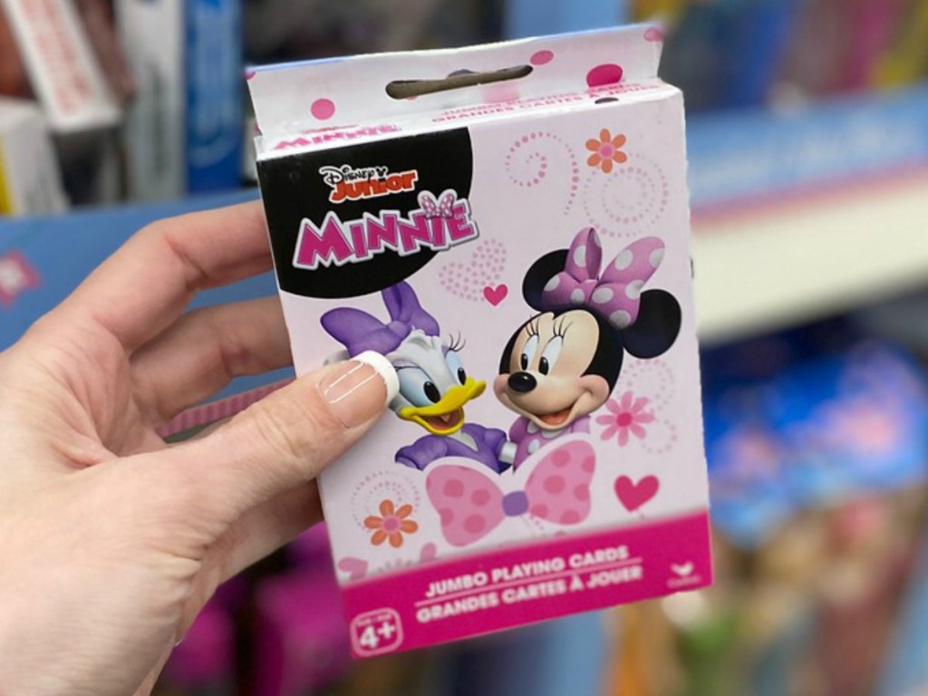 hand holding little pack of Disney playing cards