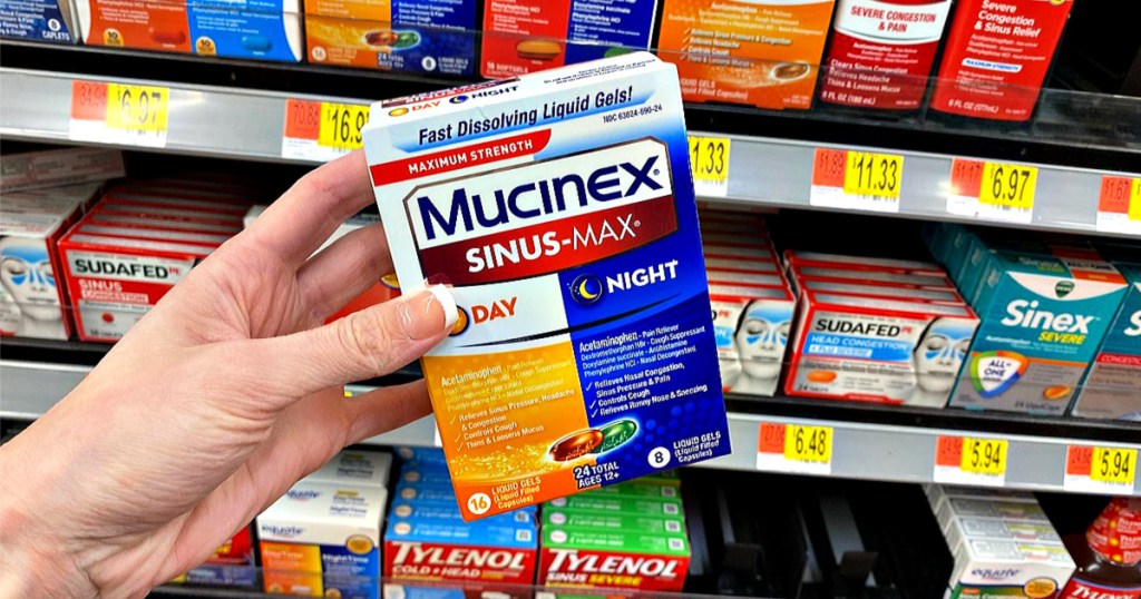 Mucinex Sinus-Max in woman's hand at Walmart
