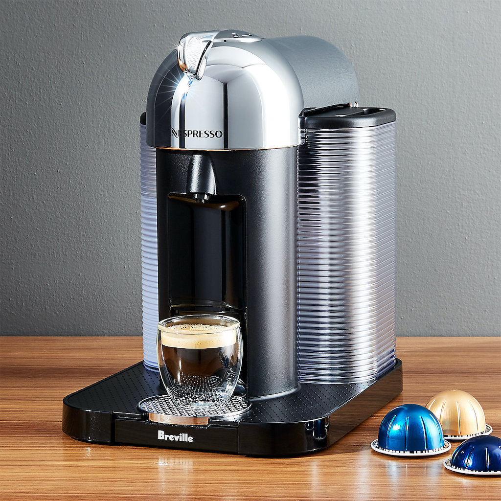 single serve coffee maker with pods sitting on the counter - nespresso machine black friday deals