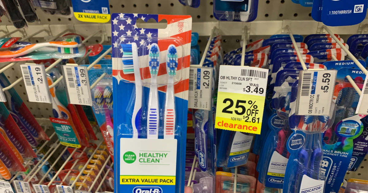 Oral B toothbrushes in front of shelf 