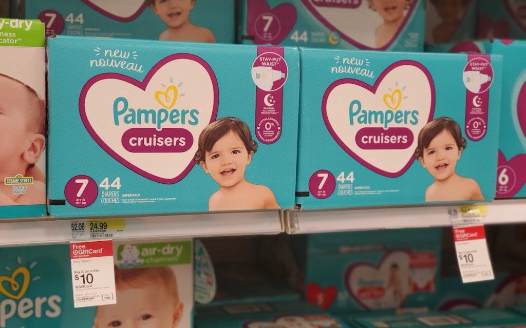 shelf with boxes of Pampers diapers at Target