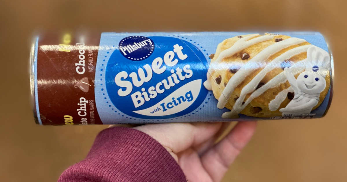 Tube of dessert biscuits in hand in-store