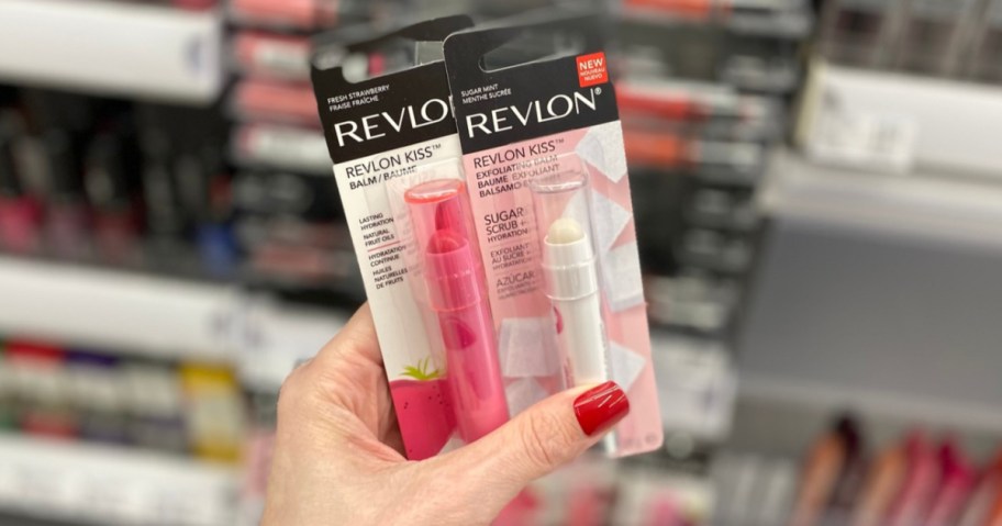 Woman's Hand holding Revlon Kiss Lip Balm