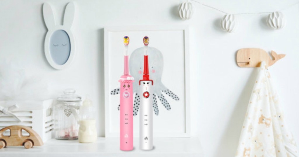 pink and white sonic kids whitening toothbrushes