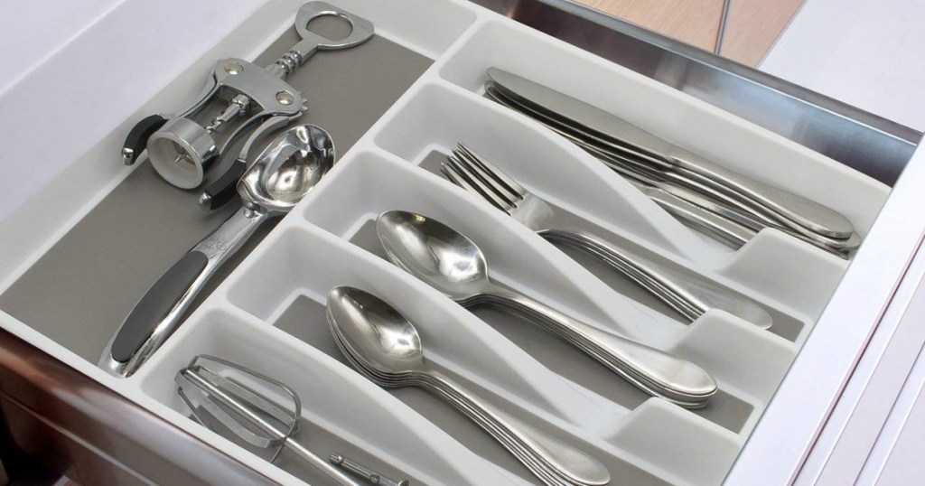 drawer with an organizer and cutlery in it