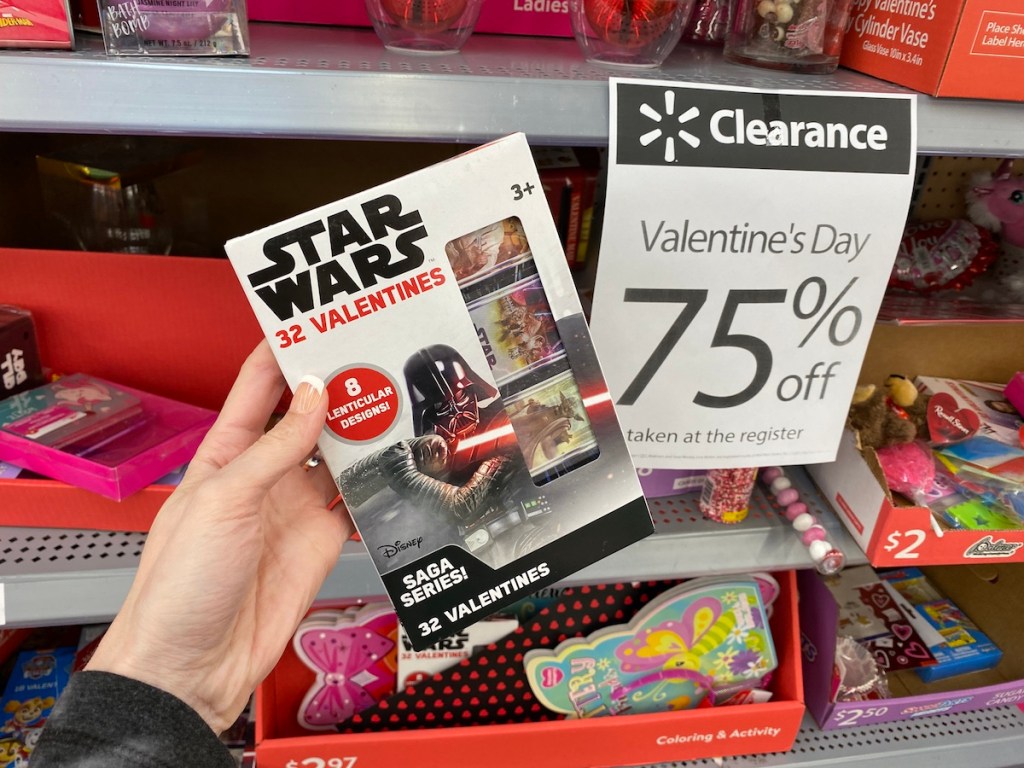 hand holding box of Star Wars cards