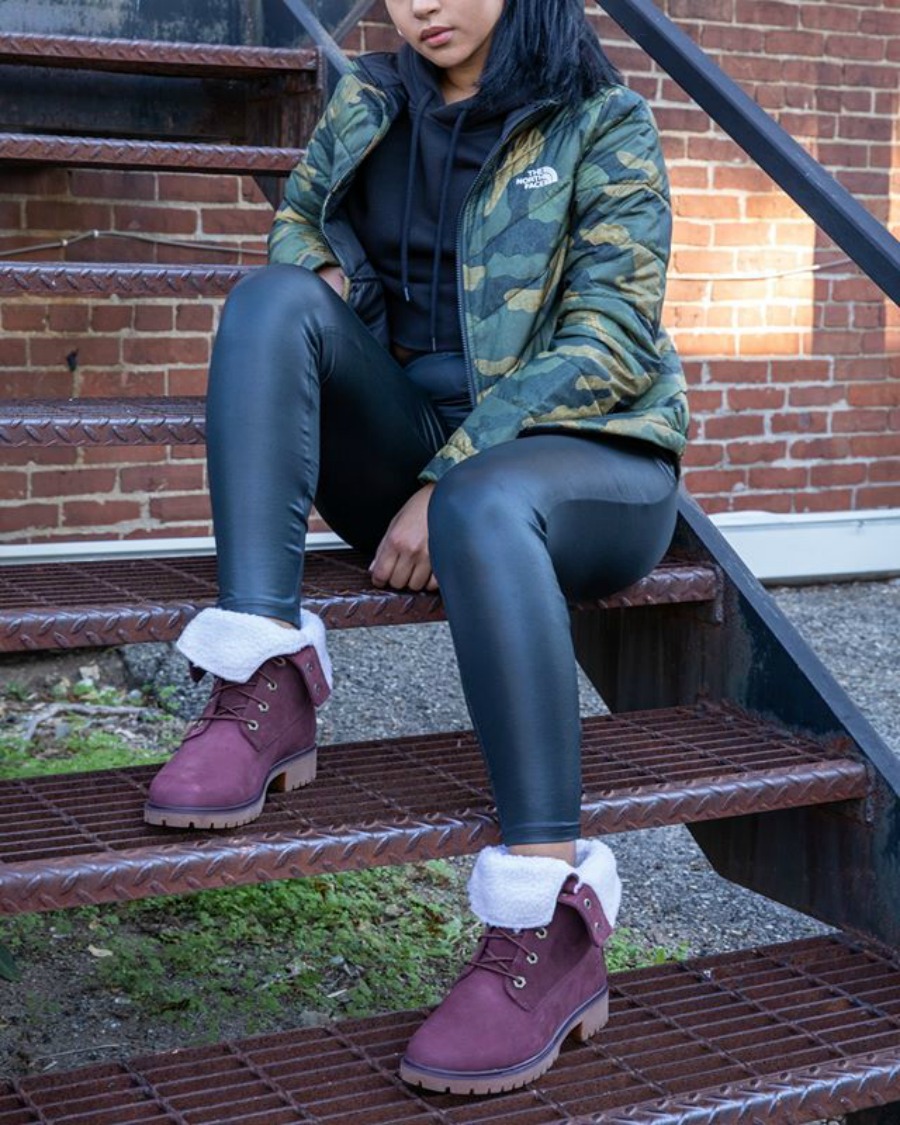 women wearing timbs