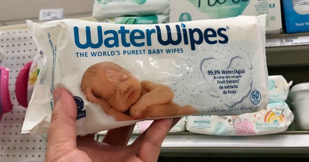 lady holding baby water wipes