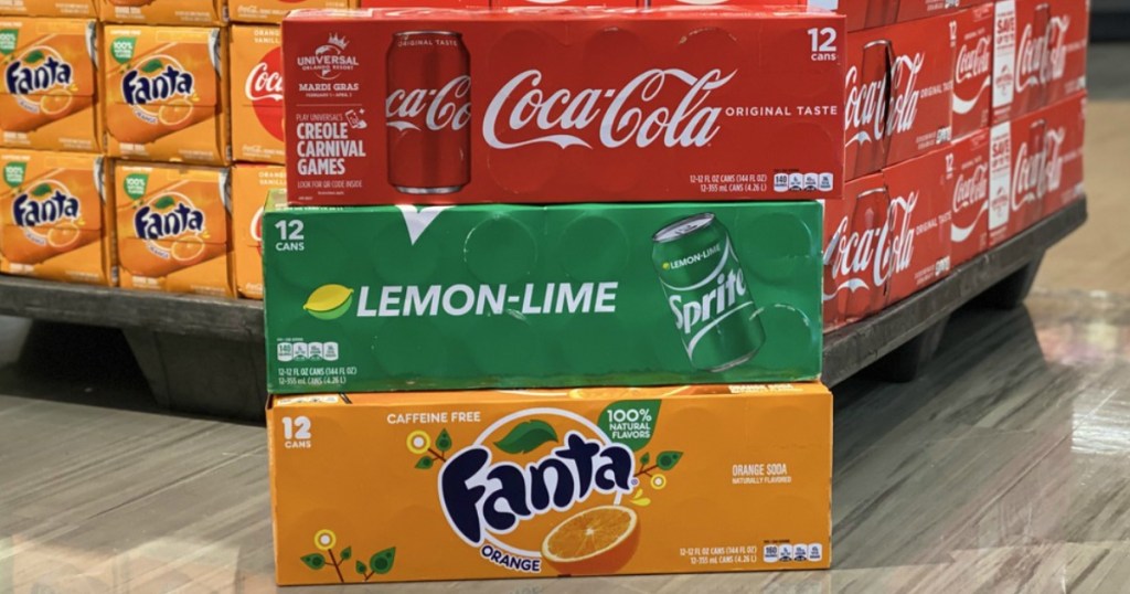 stack of Fanta, Sprite and Coca-Cola 12-packs