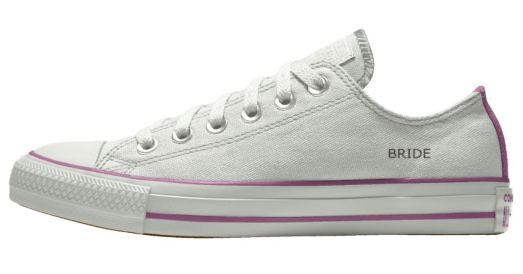 white Converse shoes with "bride" text