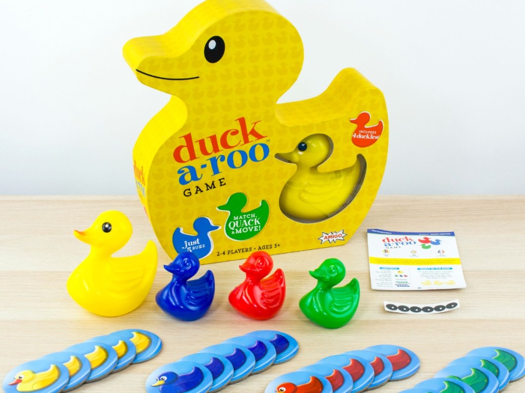 game shaped like a duck with game pieces on table