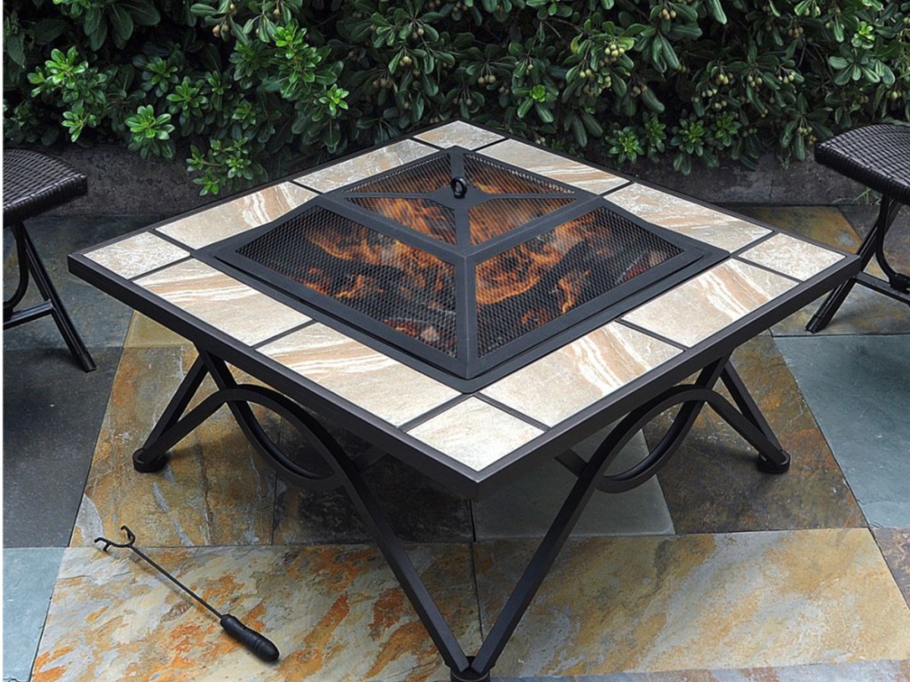 Ceramic Tile Fire Table with lit flame outside