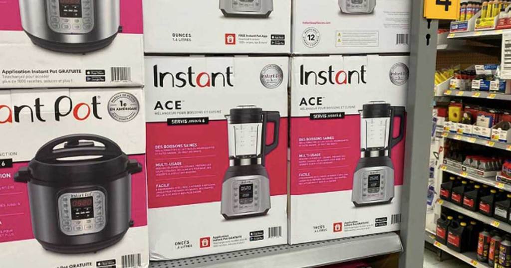 Instant Pot Ace 60 Cooking Blender in boxes on shelves in store