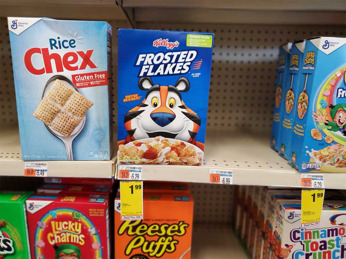 kellogg's frosted flakes on display in a store on a shelf