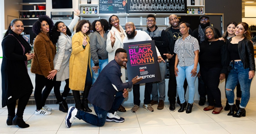 group of people celebrating Black History Month at Macy's