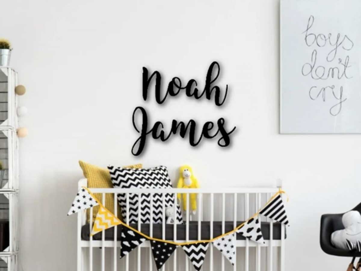 baby first and middle name sign in a nursery