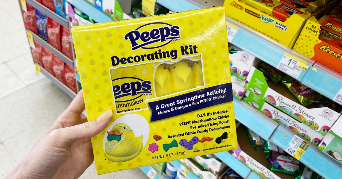 hand holding peeps decorating kit in walgreens store