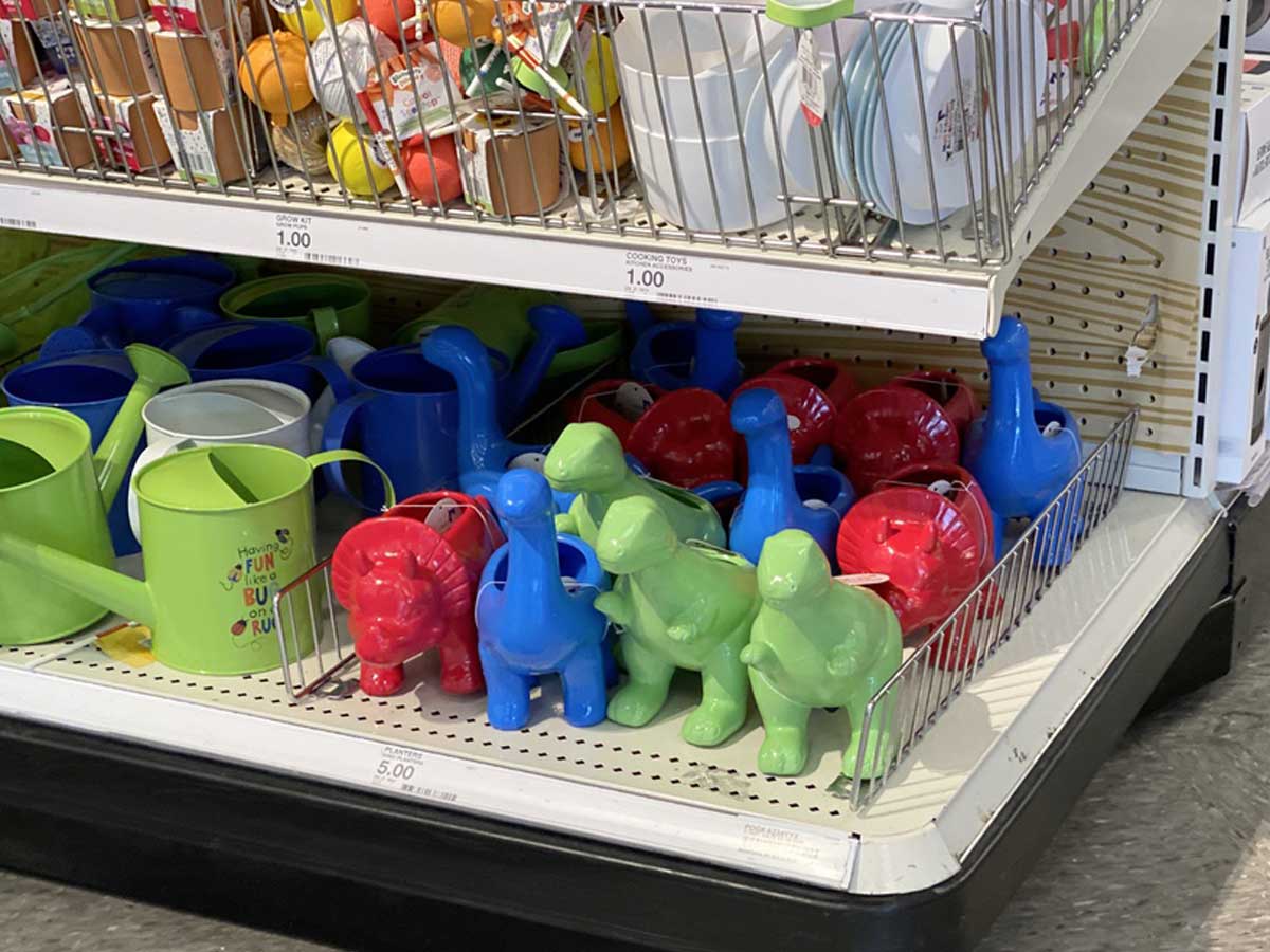 dinosaur planters on a Target store shelf