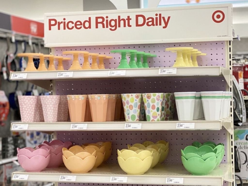 store shelf featuring melamine cupcake stands, cups and flower shaped bowls 